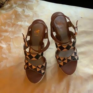 Brown and tan platform heels